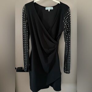 Elegant Black Dress with Embellished Sleeves